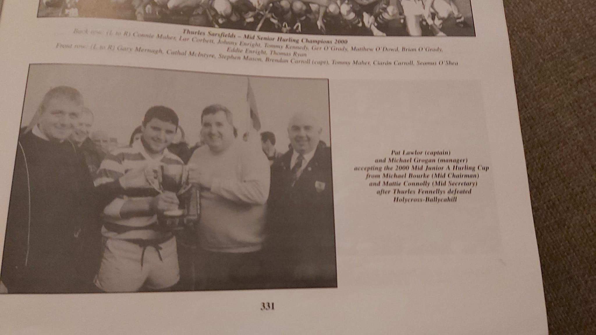 Pat Lawlor (captain) and Michael Grogan (manager) accepting the 2000 Mid Junior A Hurling Cup